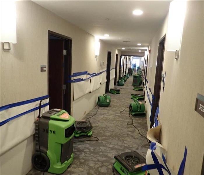 Drying equipment in hallway.