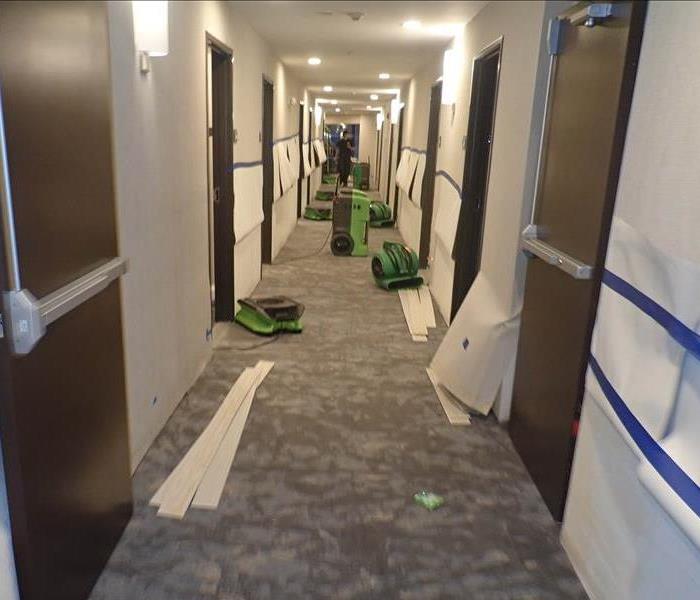 Drying equipment in commercial hallway.