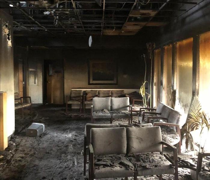 Fire damage to waiting room in a business.