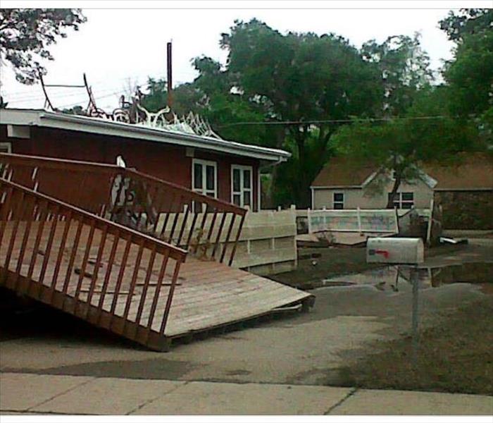 Exterior of home with flooding.