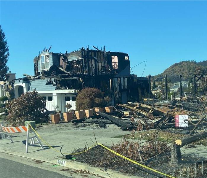 Exterior of home destroyed by a fire.